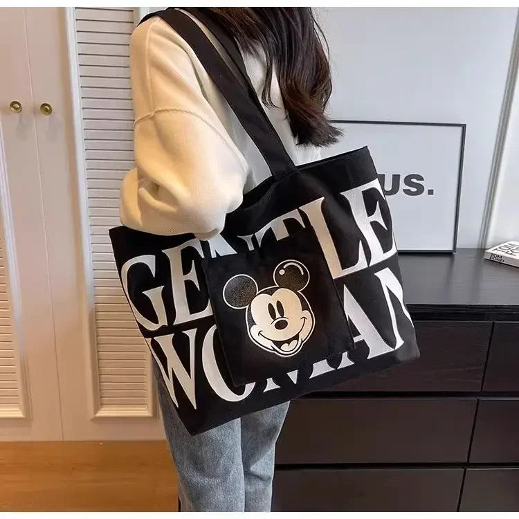 Disney Large Capacity Canvas Bag Women's 2025 New Mickey Cartoon Versatile Shoulder Bag Student Class Commuting Tote Bag