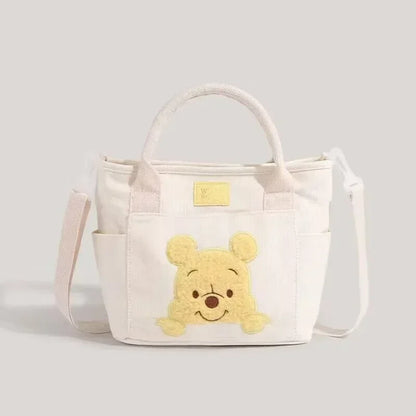 2024 New Disney Cute Cartoon Winnie the Pooh Canvas Crossbody Bag Doll Portable Handheld Crossbody Two-Purpose Bag