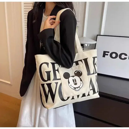 Disney Large Capacity Canvas Bag Women's 2025 New Mickey Cartoon Versatile Shoulder Bag Student Class Commuting Tote Bag