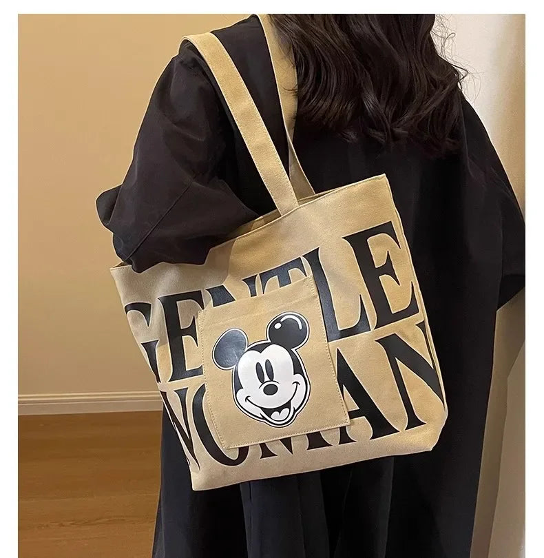 Disney Large Capacity Canvas Bag Women's 2025 New Mickey Cartoon Versatile Shoulder Bag Student Class Commuting Tote Bag