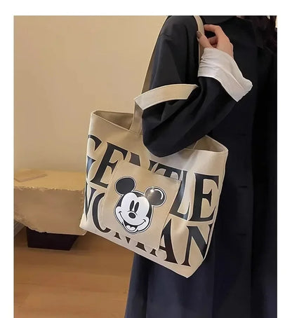 Disney Large Capacity Canvas Bag Women's 2025 New Mickey Cartoon Versatile Shoulder Bag Student Class Commuting Tote Bag