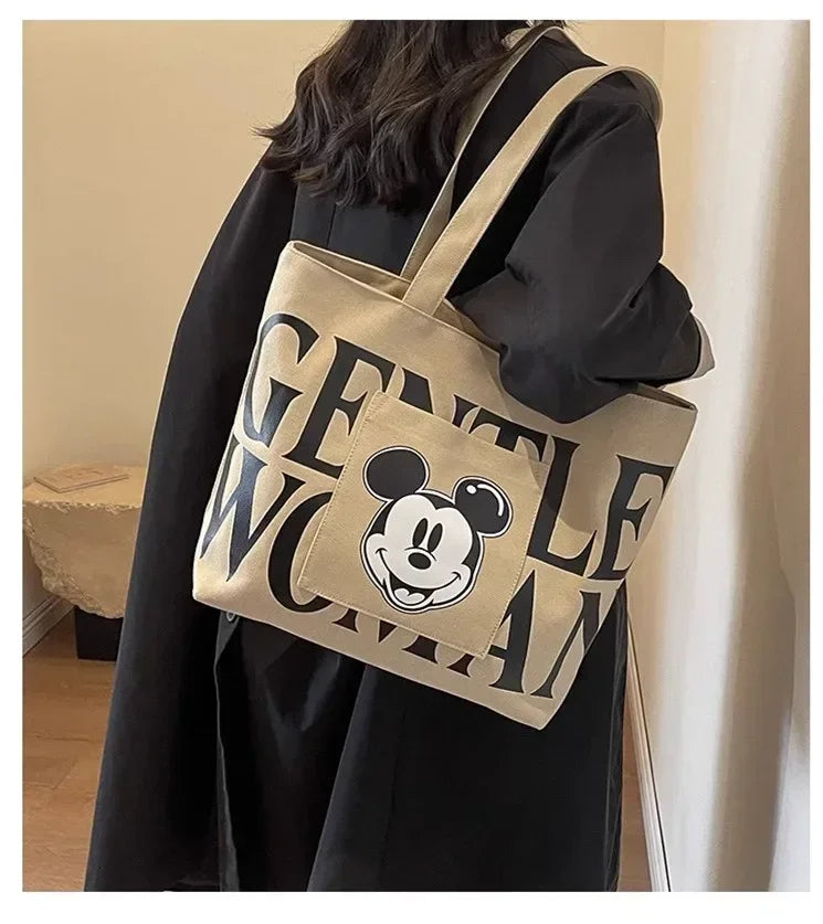 Disney Large Capacity Canvas Bag Women's 2025 New Mickey Cartoon Versatile Shoulder Bag Student Class Commuting Tote Bag