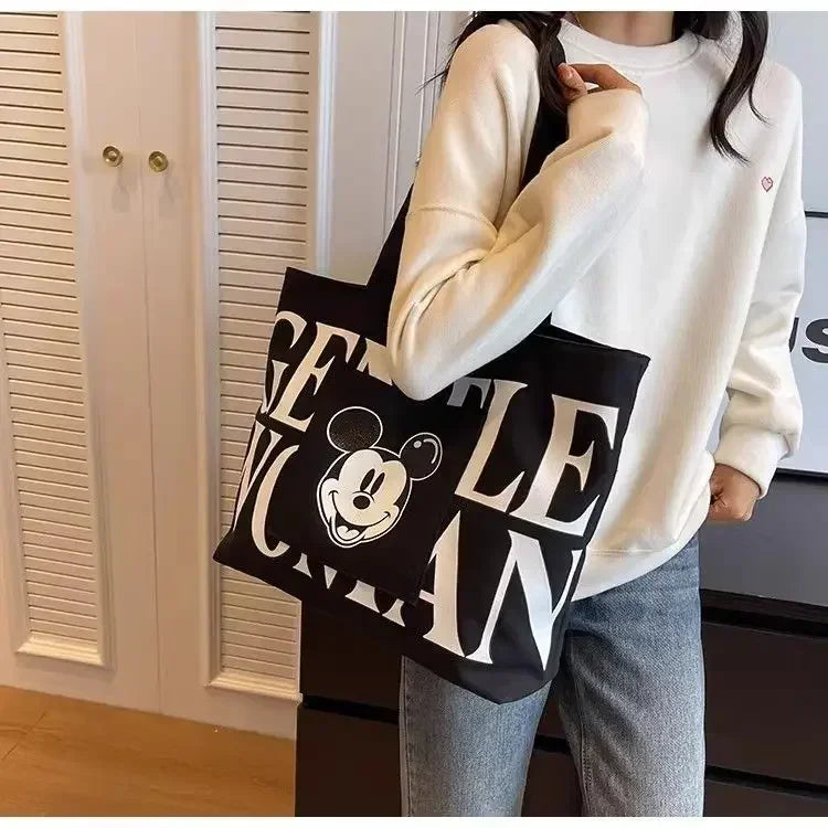 Disney Large Capacity Canvas Bag Women's 2025 New Mickey Cartoon Versatile Shoulder Bag Student Class Commuting Tote Bag